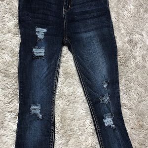 Distressed skinny jeans by Revamped